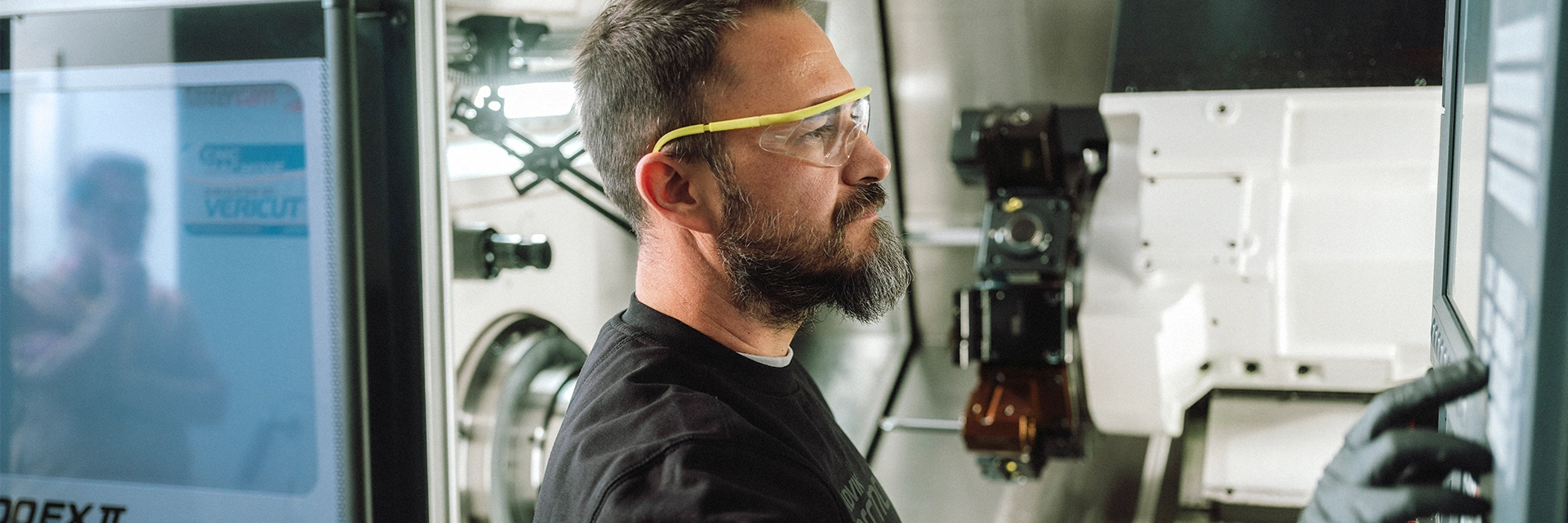 Nicola Losurdo, Center Technician, operates a CNC machine at Sandvik Coromant in Milan (Italy). (photo)